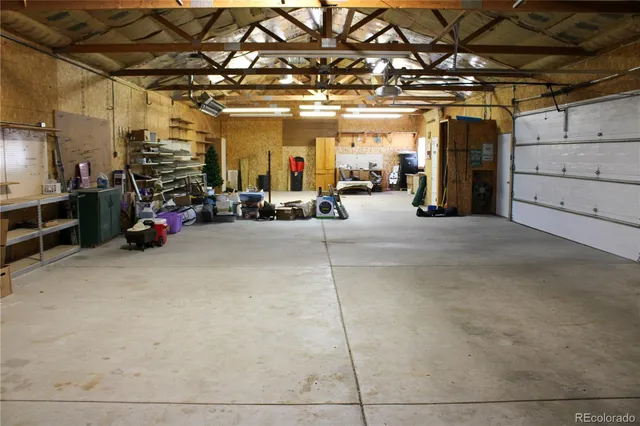 a bathroom with a sink a toilet and a shower