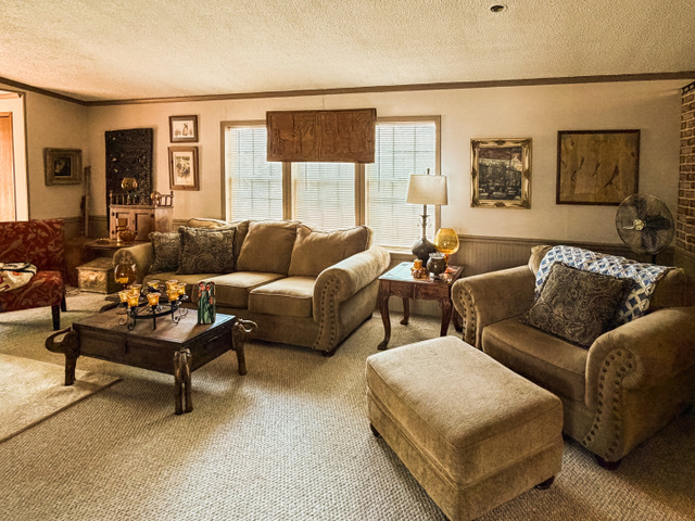 38569 North Sheridan Road, Unit 390 Beach Park, IL 60099 - Photo 15 of 28 a living room with furniture and a large window