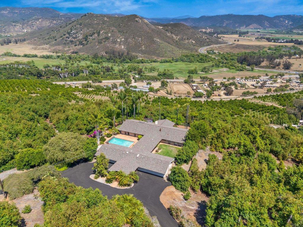 14048 San Pasqual Valley Road Escondido, CA 92027 - Photo 1 of 55 an aerial view of a house with a yard