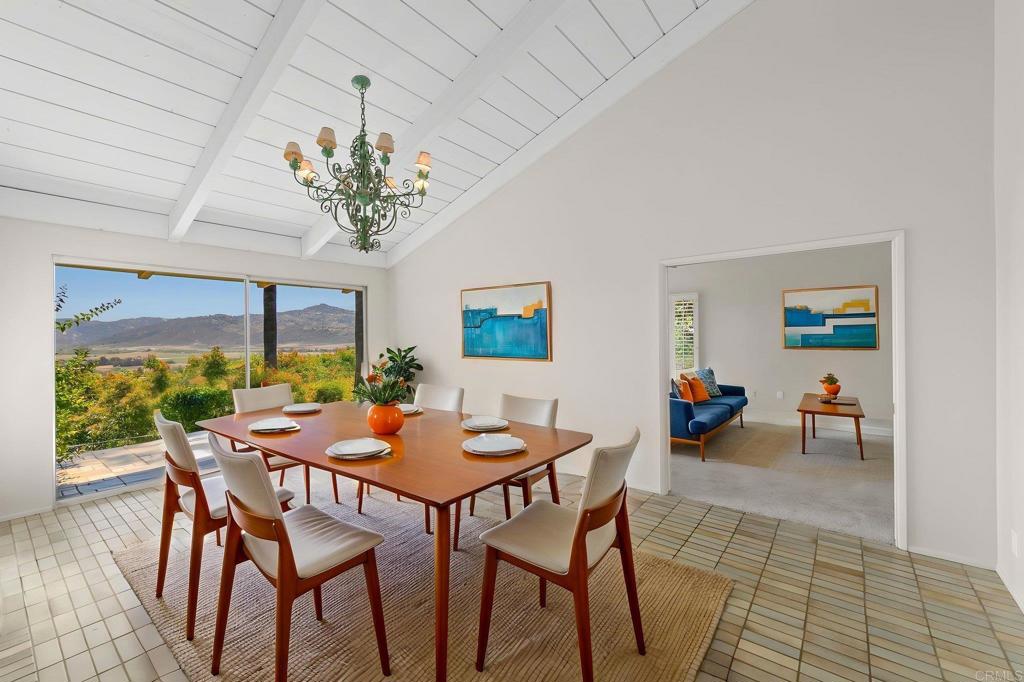 14048 San Pasqual Valley Road Escondido, CA 92027 - Photo 12 of 55 a view of a dining room with furniture window and outside view