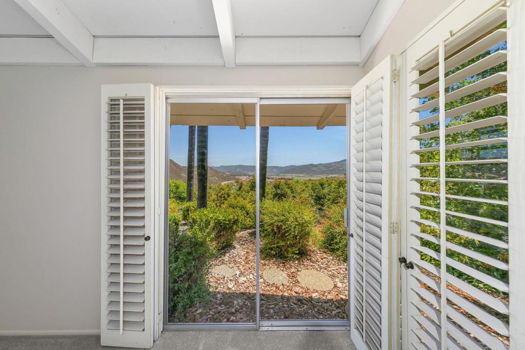 14048 San Pasqual Valley Road Escondido, CA 92027 - Photo 17 of 55 a view of a back yard from a windows