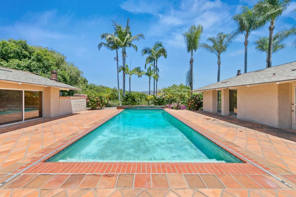 14048 San Pasqual Valley Road Escondido, CA 92027 - Photo 19 of 55 a view of a backyard of a house