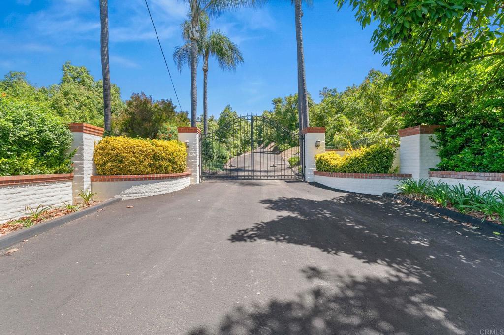 14048 San Pasqual Valley Road Escondido, CA 92027 - Photo 2 of 55 a view of a street with a building in front of it