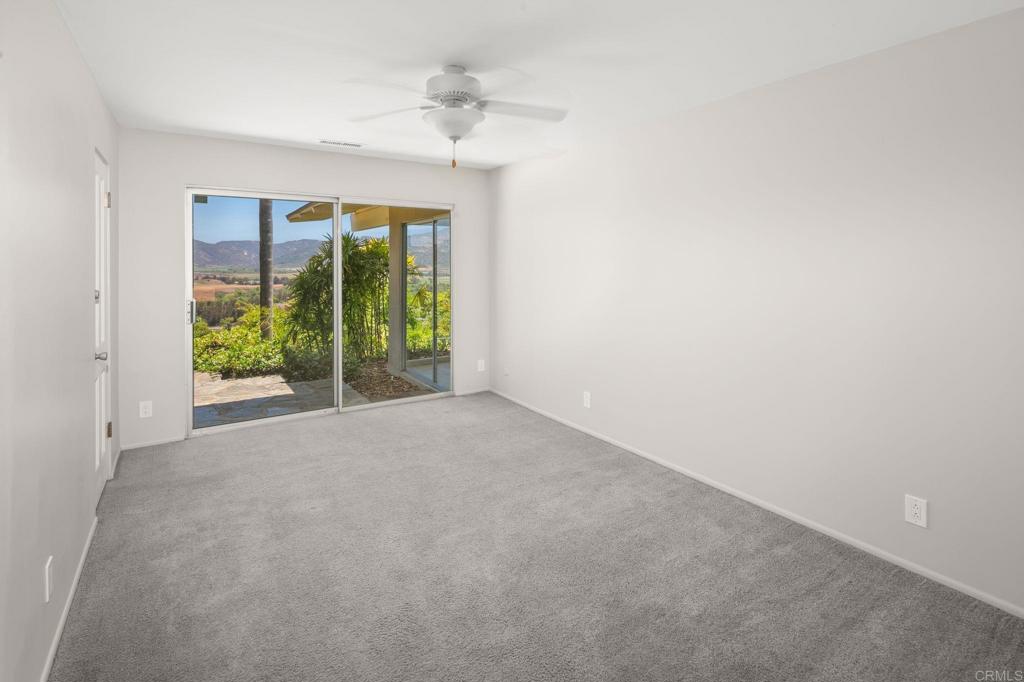 14048 San Pasqual Valley Road Escondido, CA 92027 - Photo 25 of 55 a view of an empty room with glass door