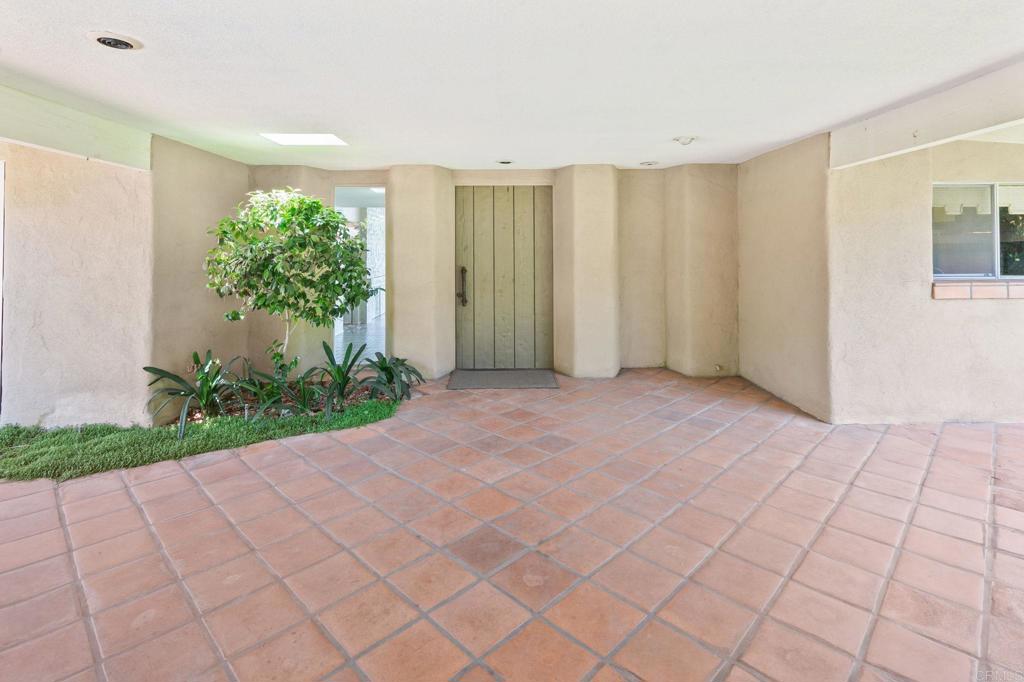 14048 San Pasqual Valley Road Escondido, CA 92027 - Photo 3 of 55 an empty room with windows