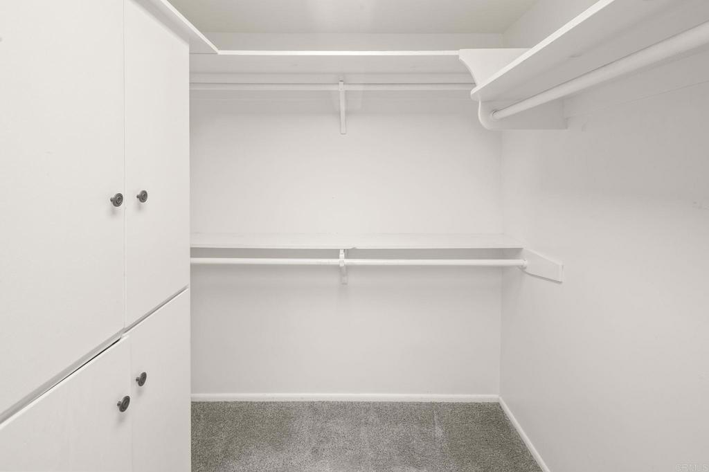 14048 San Pasqual Valley Road Escondido, CA 92027 - Photo 38 of 55 a view of an empty walk in closet