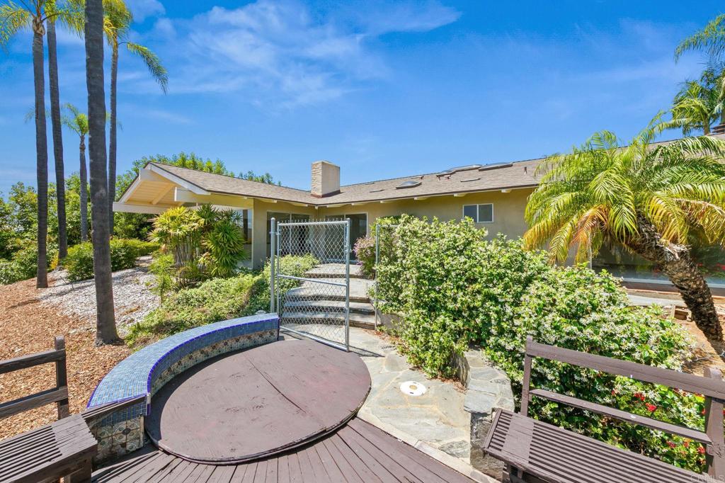 14048 San Pasqual Valley Road Escondido, CA 92027 - Photo 40 of 55 a view of a house with a backyard