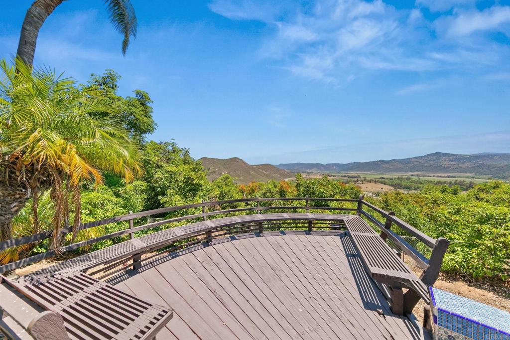 14048 San Pasqual Valley Road Escondido, CA 92027 - Photo 41 of 55 a view of balcony with mountain view and wooden floor