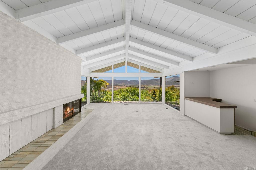 14048 San Pasqual Valley Road Escondido, CA 92027 - Photo 5 of 55 a view of an empty room with a window