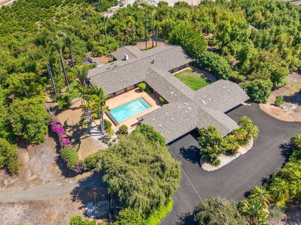 14048 San Pasqual Valley Road Escondido, CA 92027 - Photo 53 of 55 an aerial view of a house with a garden and a yard