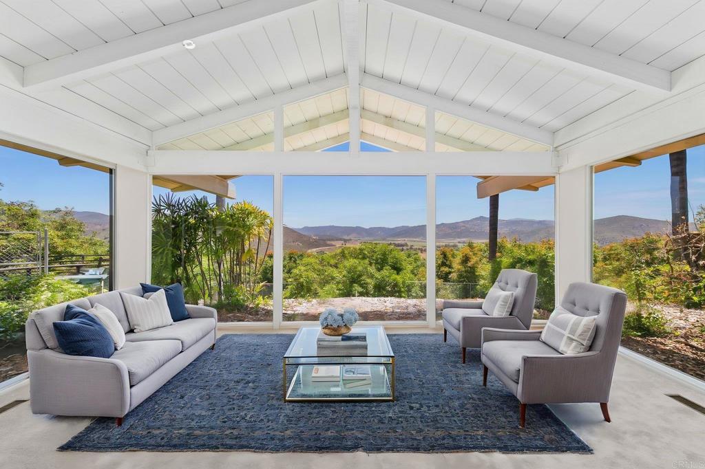 14048 San Pasqual Valley Road Escondido, CA 92027 - Photo 10 of 55 a living room with furniture and a large window