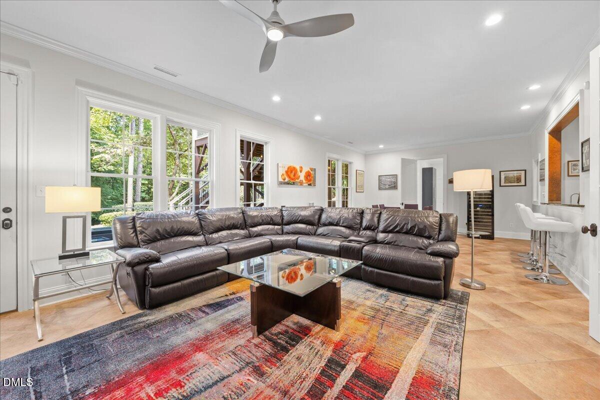 1504 Consett Court Raleigh, NC 27613 - Photo 53 of 81 Lower level living/bonus with gas fireplace