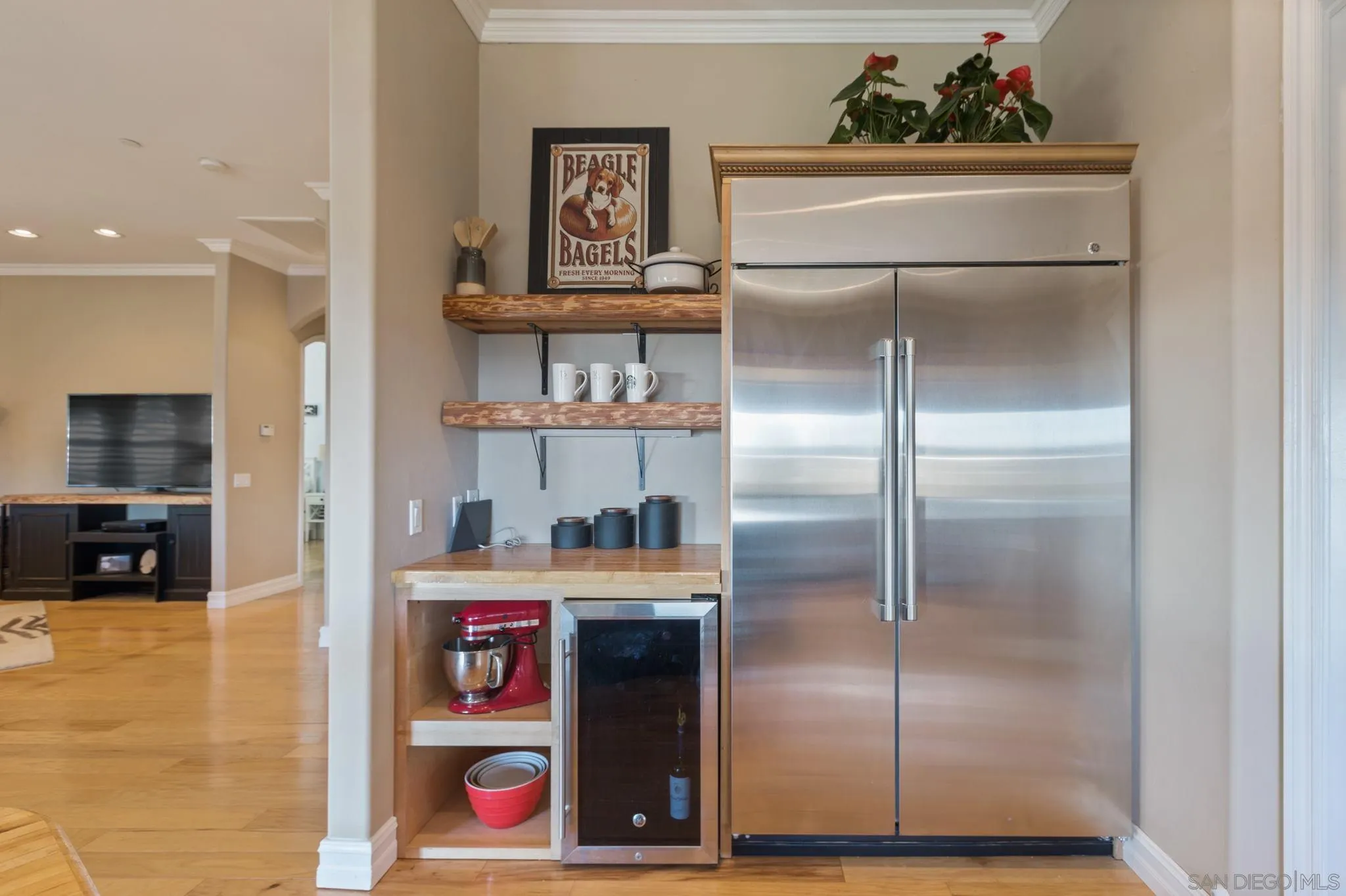 30419 Canyon Estates Road Vista, CA 92084 - Photo 25 of 75 a kitchen with a refrigerator and cabinets