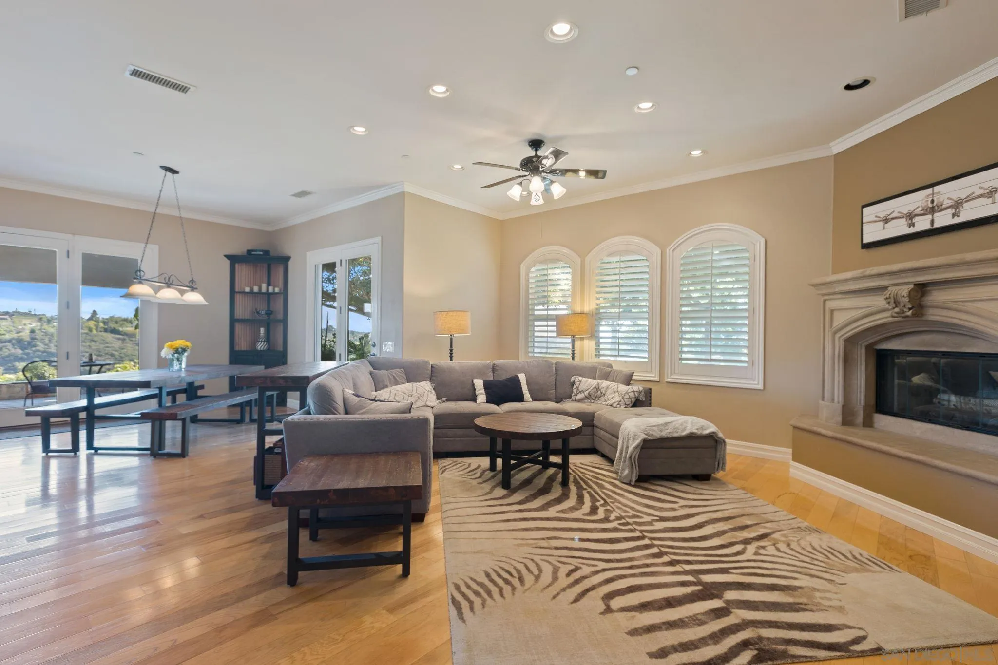 30419 Canyon Estates Road Vista, CA 92084 - Photo 27 of 75 a living room with furniture and a fireplace