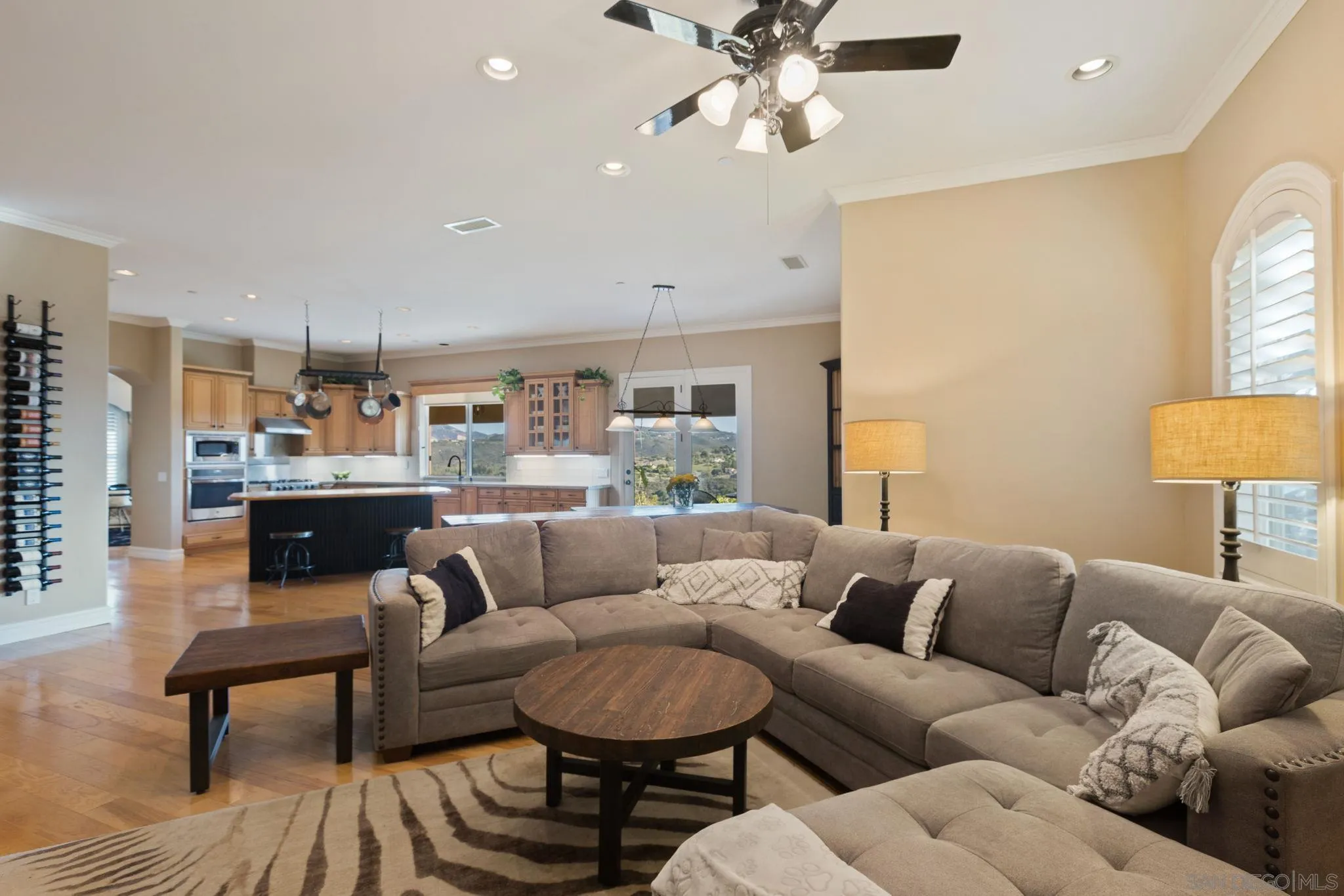 30419 Canyon Estates Road Vista, CA 92084 - Photo 30 of 75 a living room with furniture and a chandelier