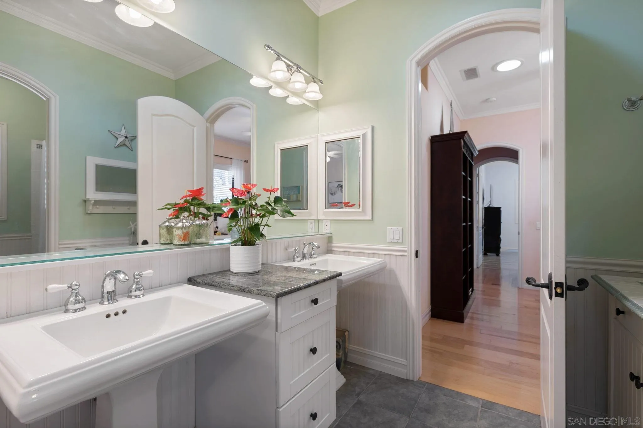 30419 Canyon Estates Road Vista, CA 92084 - Photo 35 of 75 a bathroom with a sink vanity and a mirror