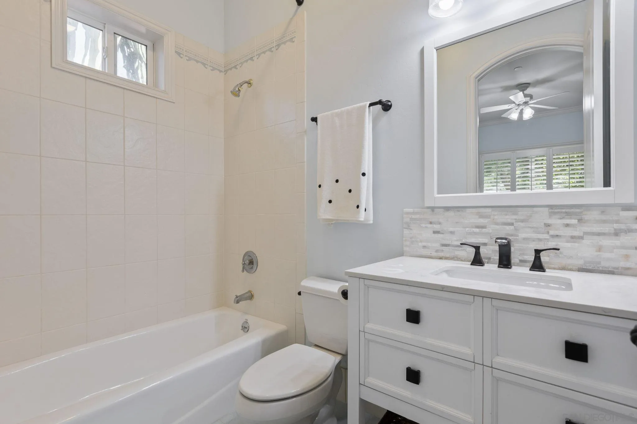 30419 Canyon Estates Road Vista, CA 92084 - Photo 41 of 75 a bathroom with a sink a toilet and bathtub