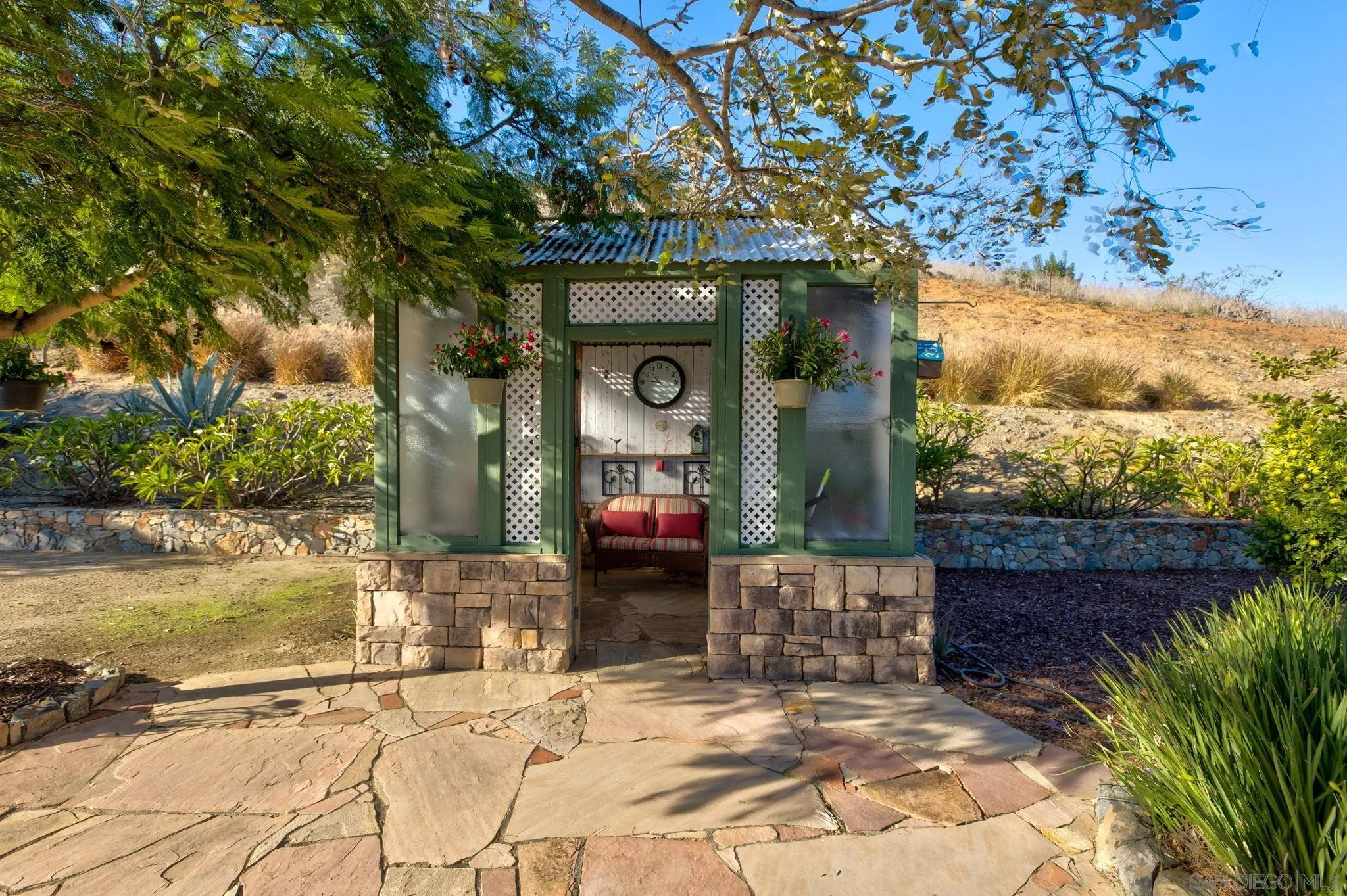 30419 Canyon Estates Road Vista, CA 92084 - Photo 49 of 75 a front view of a house with a yard