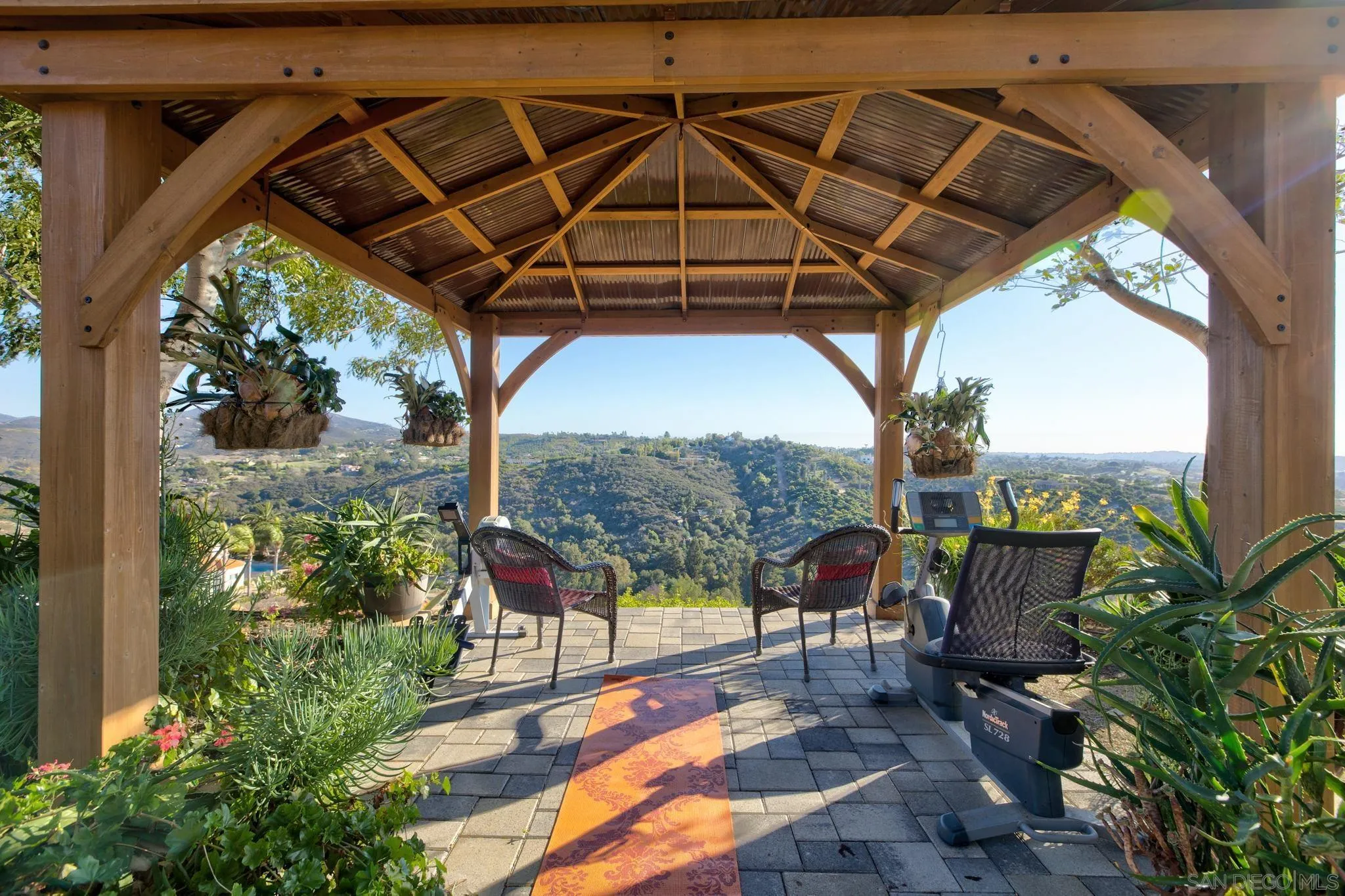 30419 Canyon Estates Road Vista, CA 92084 - Photo 52 of 75 a patio with water view fountain with potted plants