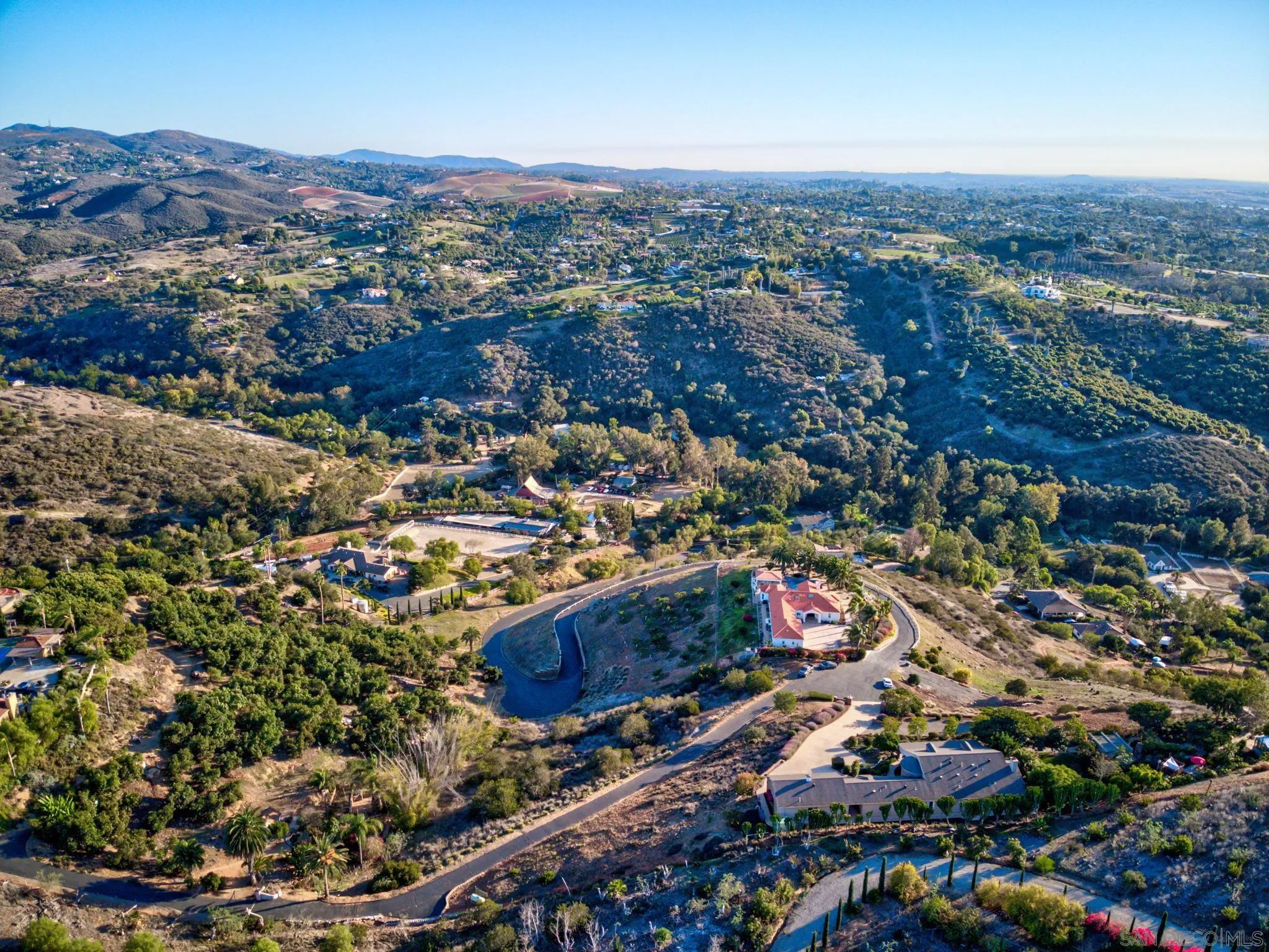 30419 Canyon Estates Road Vista, CA 92084 - Photo 64 of 75 an aerial view of residential houses with outdoor space and trees
