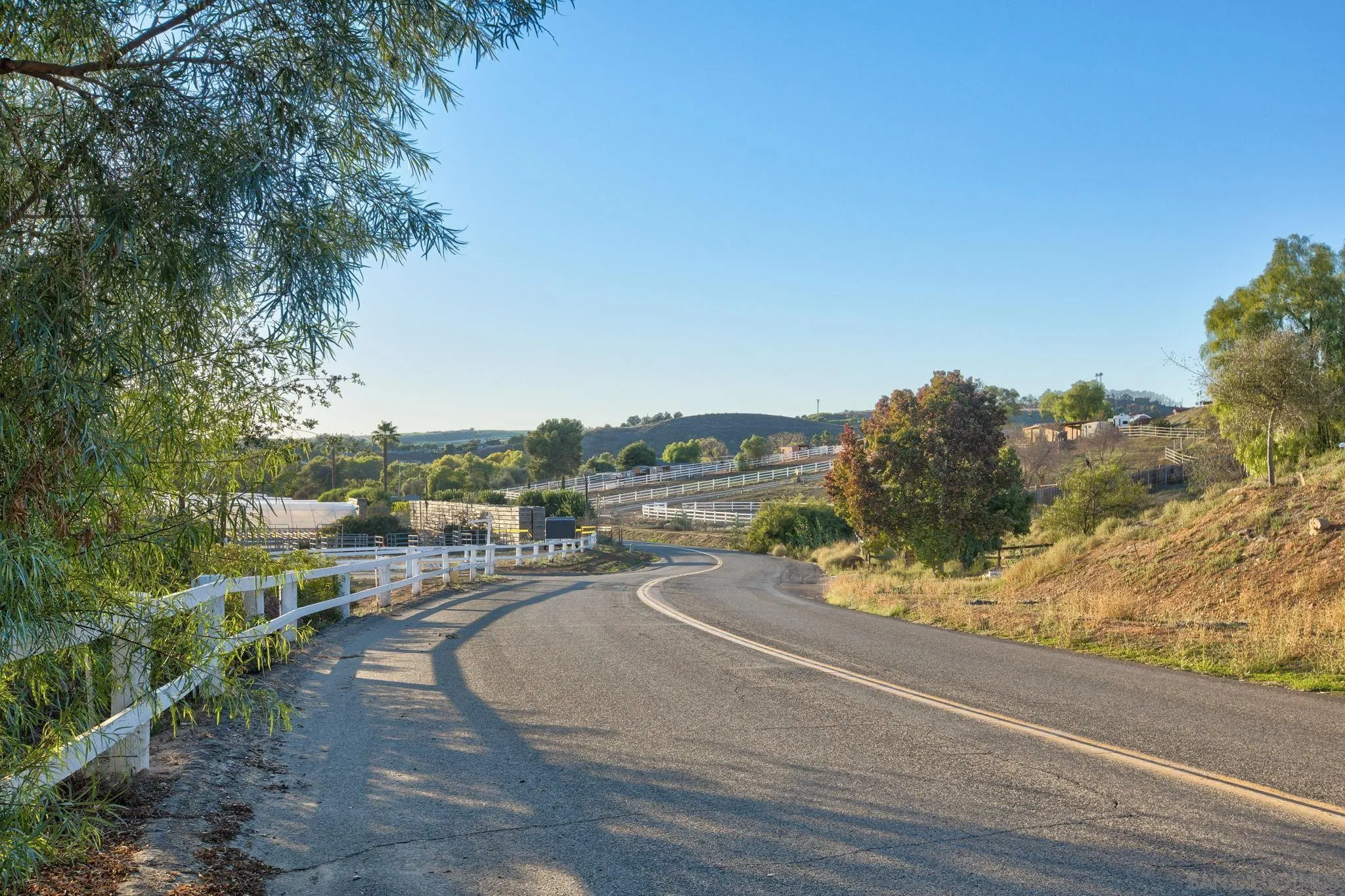 30419 Canyon Estates Road Vista, CA 92084 - Photo 68 of 75 a view of a road with a yard