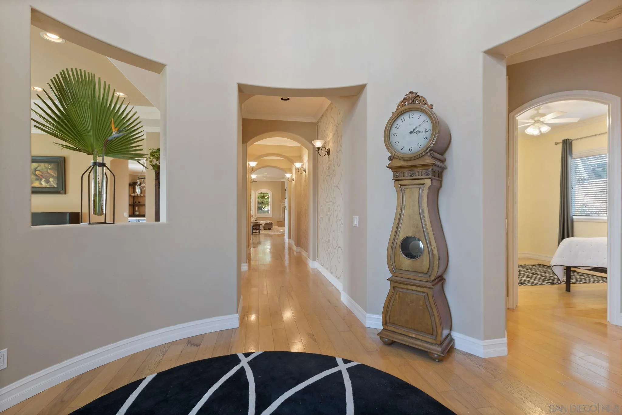 30419 Canyon Estates Road Vista, CA 92084 - Photo 7 of 75 a view of a livingroom with furniture and a mirror