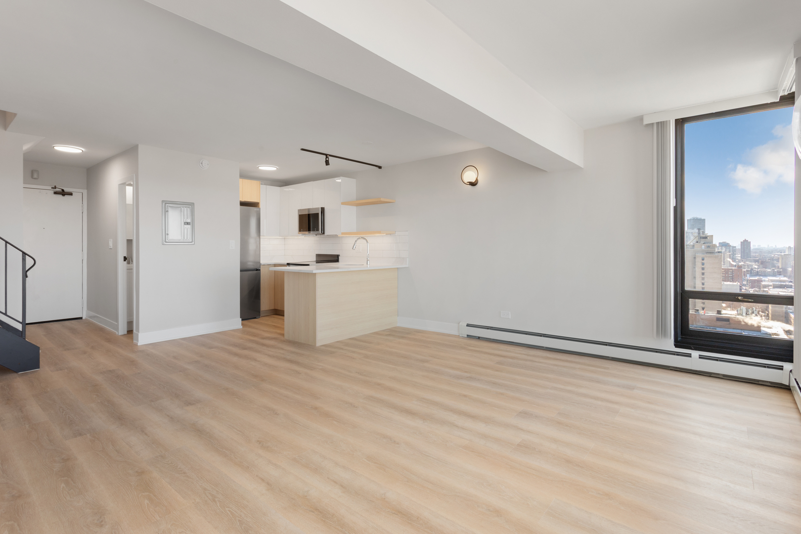 6166 North Sheridan Road, Unit 2L Chicago, IL 60660 - Photo 2 of 15 a view of an empty room with a window