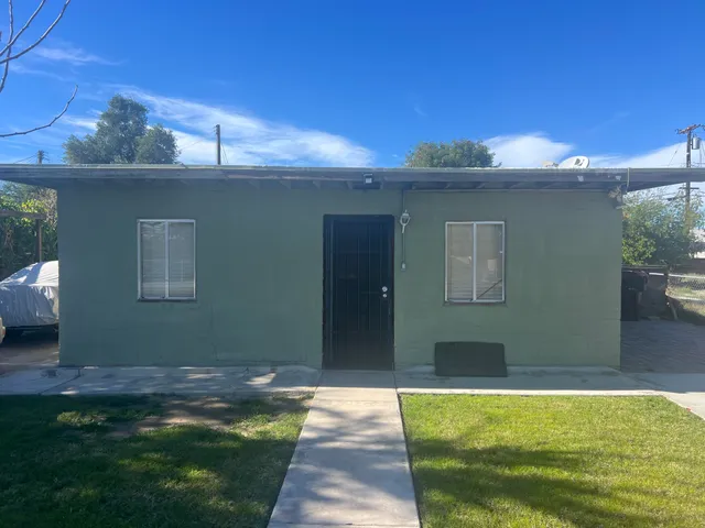 a view of swimming pool with seating space