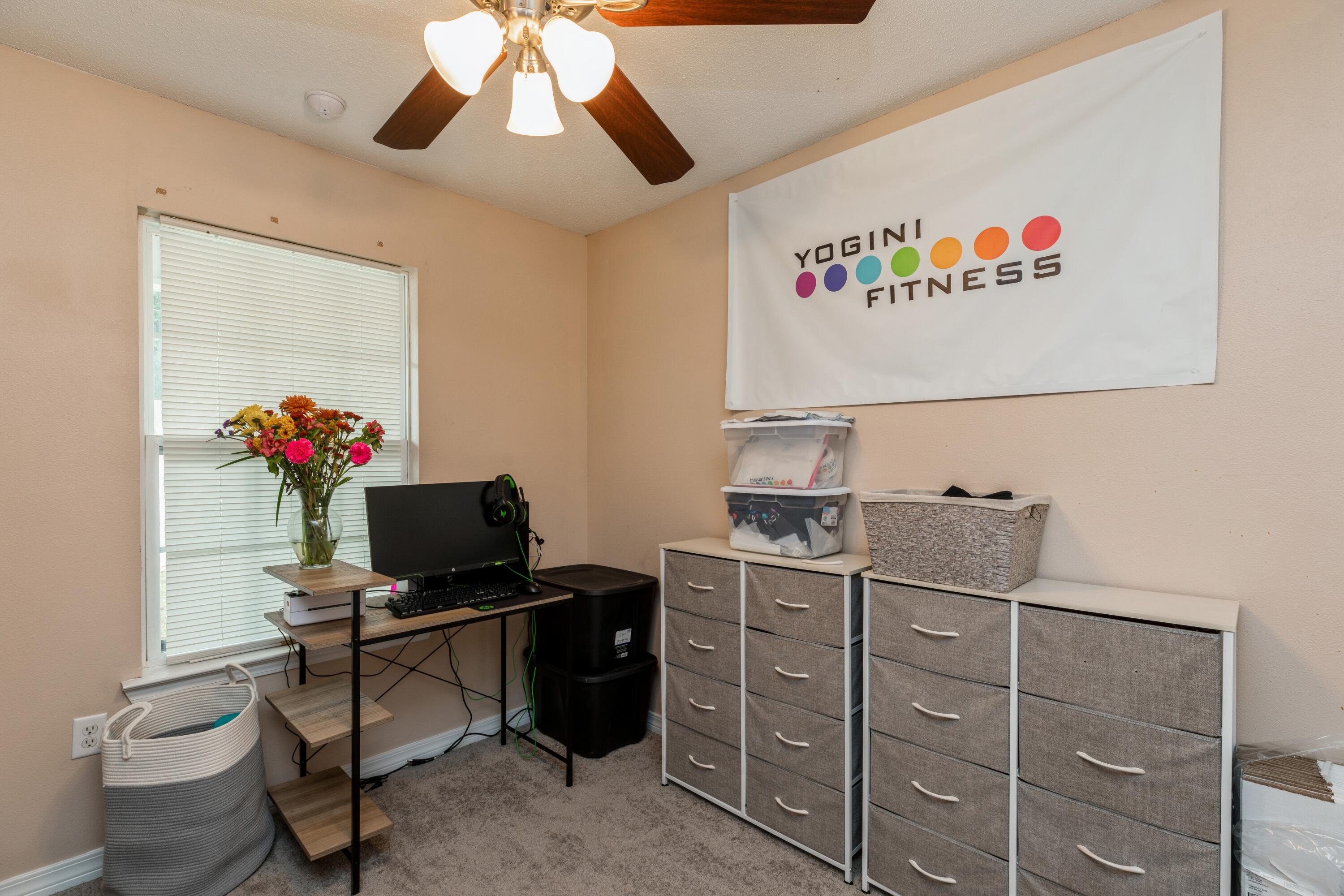 200 Wainwright Drive Crestview, FL 32539 - Photo 3 of 17 a view of a workspace with furniture