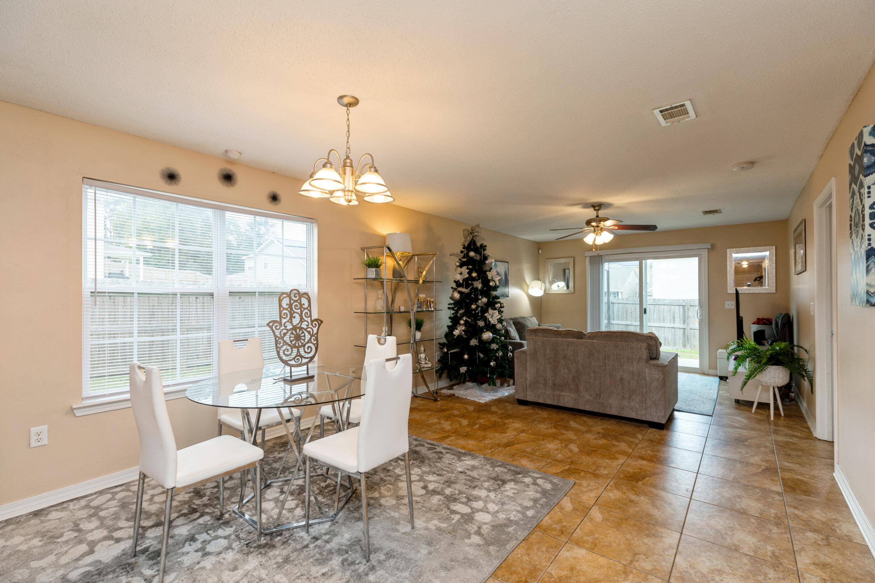 200 Wainwright Drive Crestview, FL 32539 - Photo 6 of 17 a living room with furniture and a large window