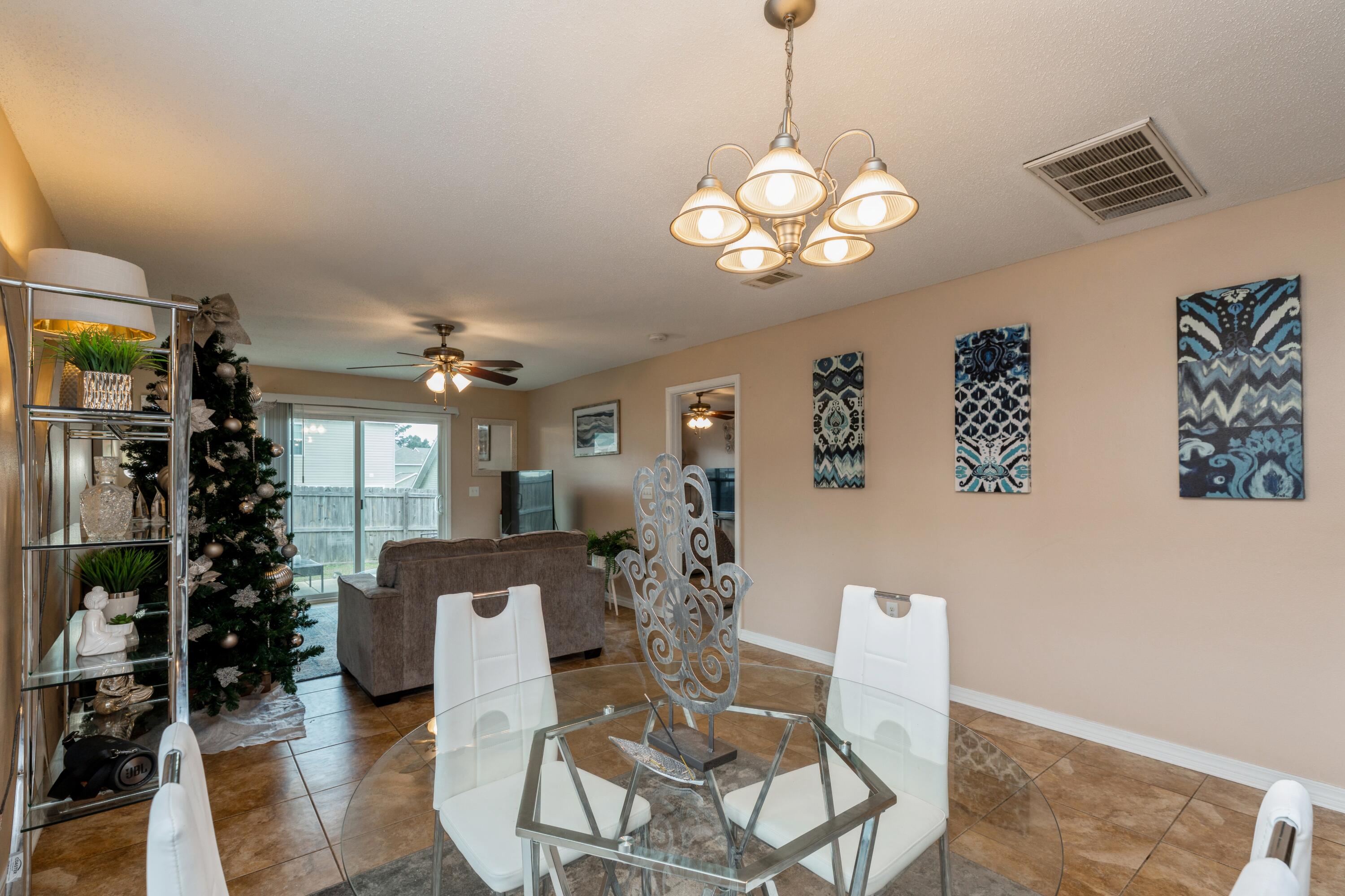 200 Wainwright Drive Crestview, FL 32539 - Photo 7 of 17 a view of a dining room with furniture