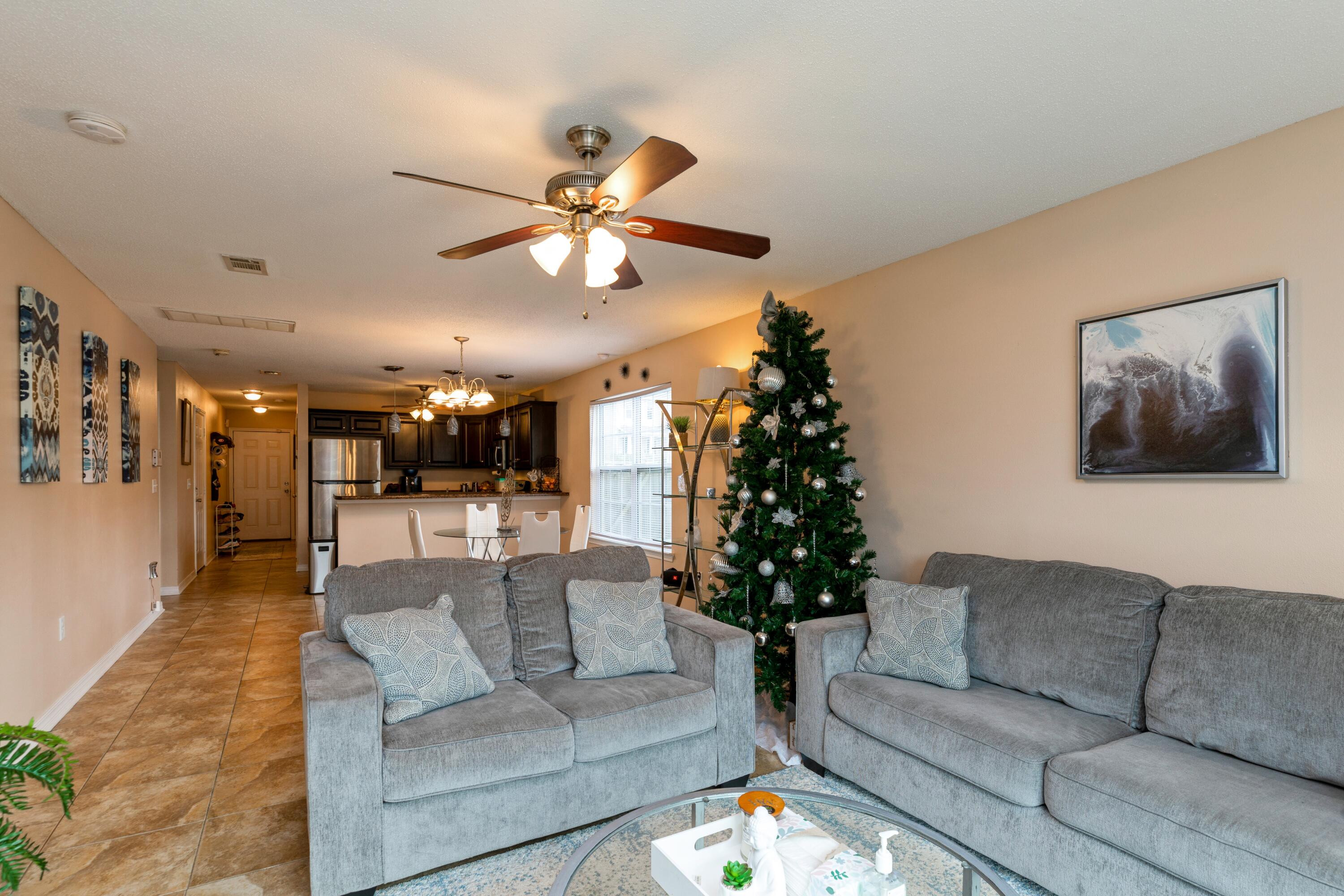 200 Wainwright Drive Crestview, FL 32539 - Photo 10 of 17 a living room with furniture and a large window