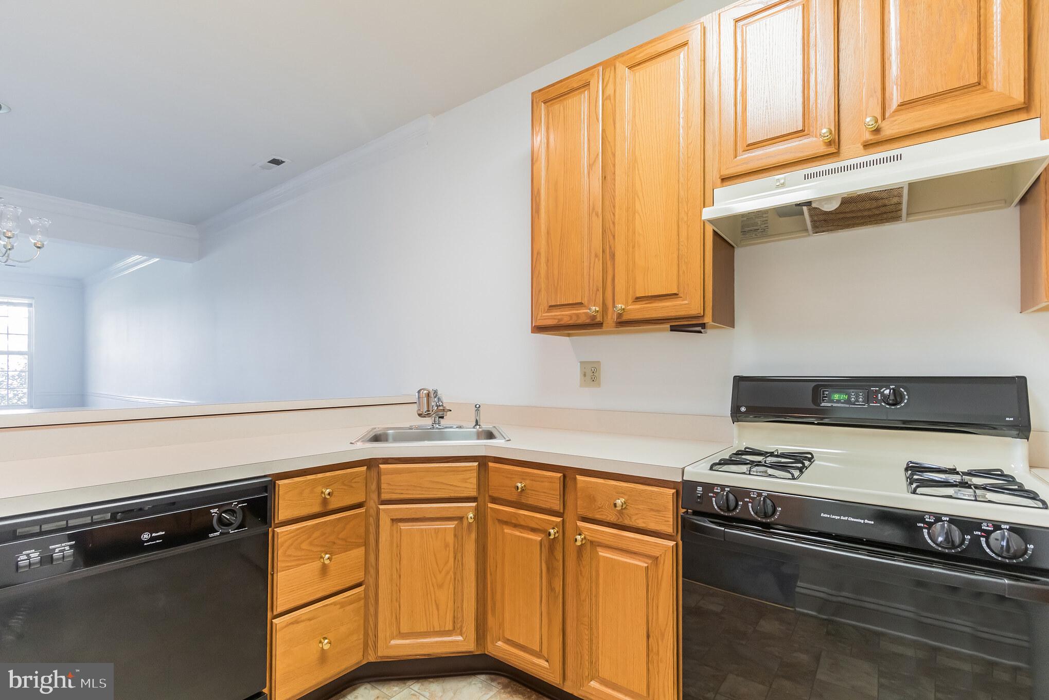 411 Ruth Court Harleysville, PA 19438 - Photo 7 of 30 Kitchen Sink Looking to Dining Area