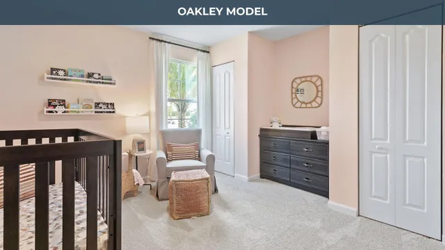 a view of a bedroom with furniture and window