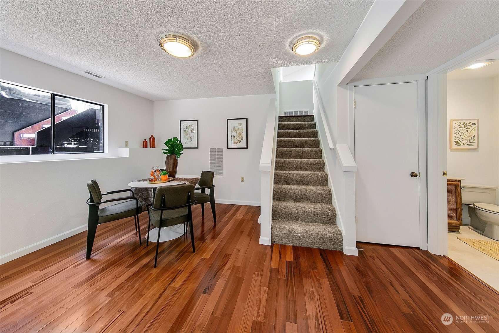 21822 4th Avenue Southeast Bothell, WA 98021 - Photo 13 of 40 a view of a livingroom with furniture and wooden floor