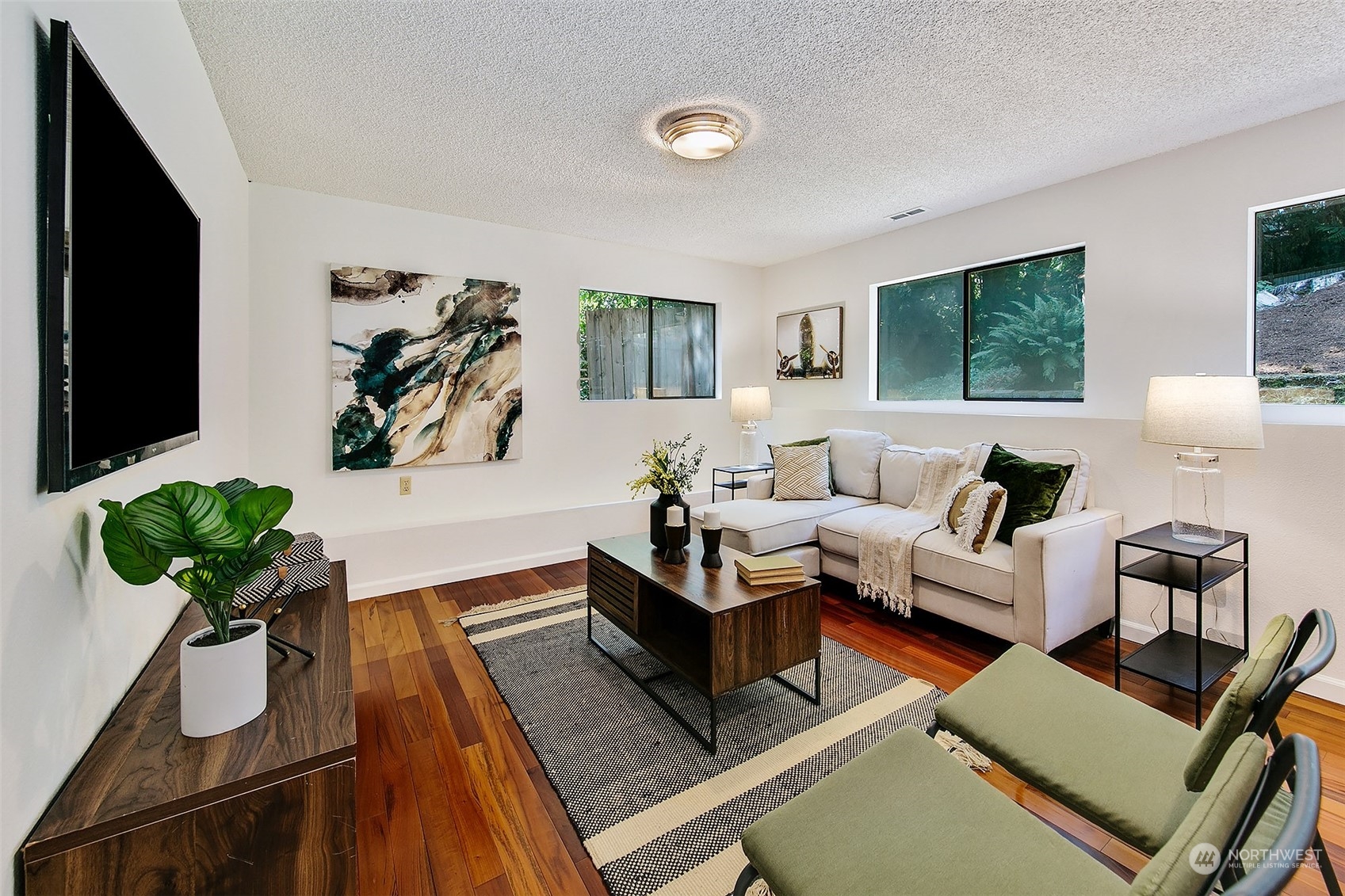 21822 4th Avenue Southeast Bothell, WA 98021 - Photo 14 of 40 a living room with furniture potted plant and a flat screen tv