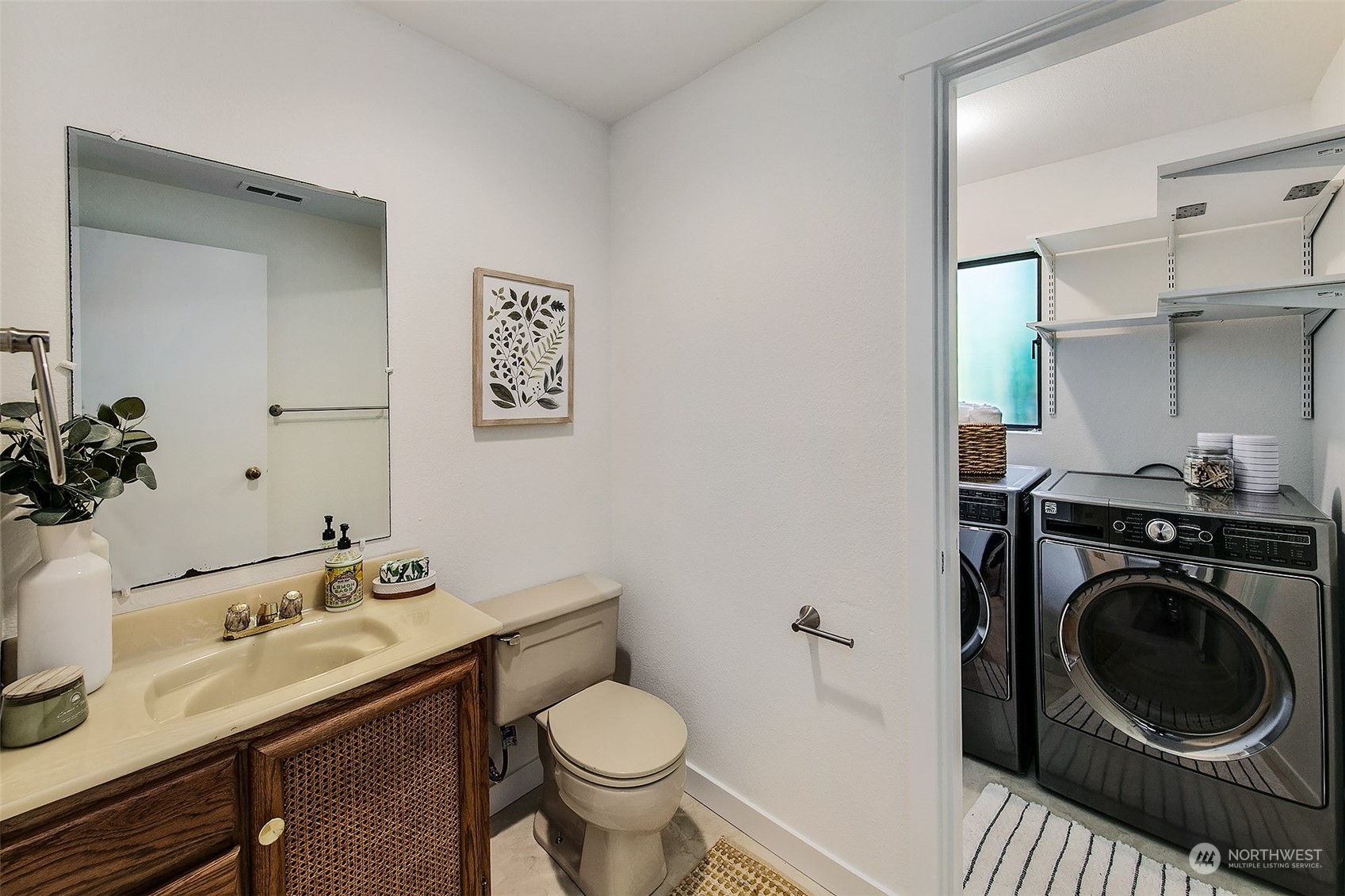 21822 4th Avenue Southeast Bothell, WA 98021 - Photo 16 of 40 a bathroom with a sink and a toilet