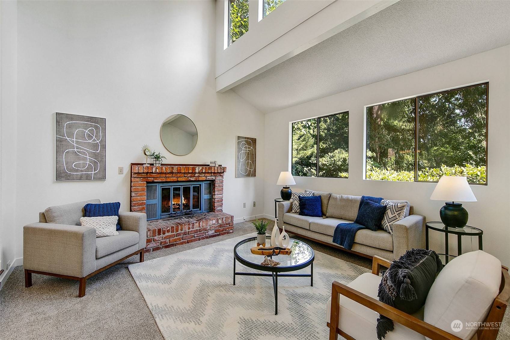 21822 4th Avenue Southeast Bothell, WA 98021 - Photo 2 of 40 a living room with furniture and a fireplace