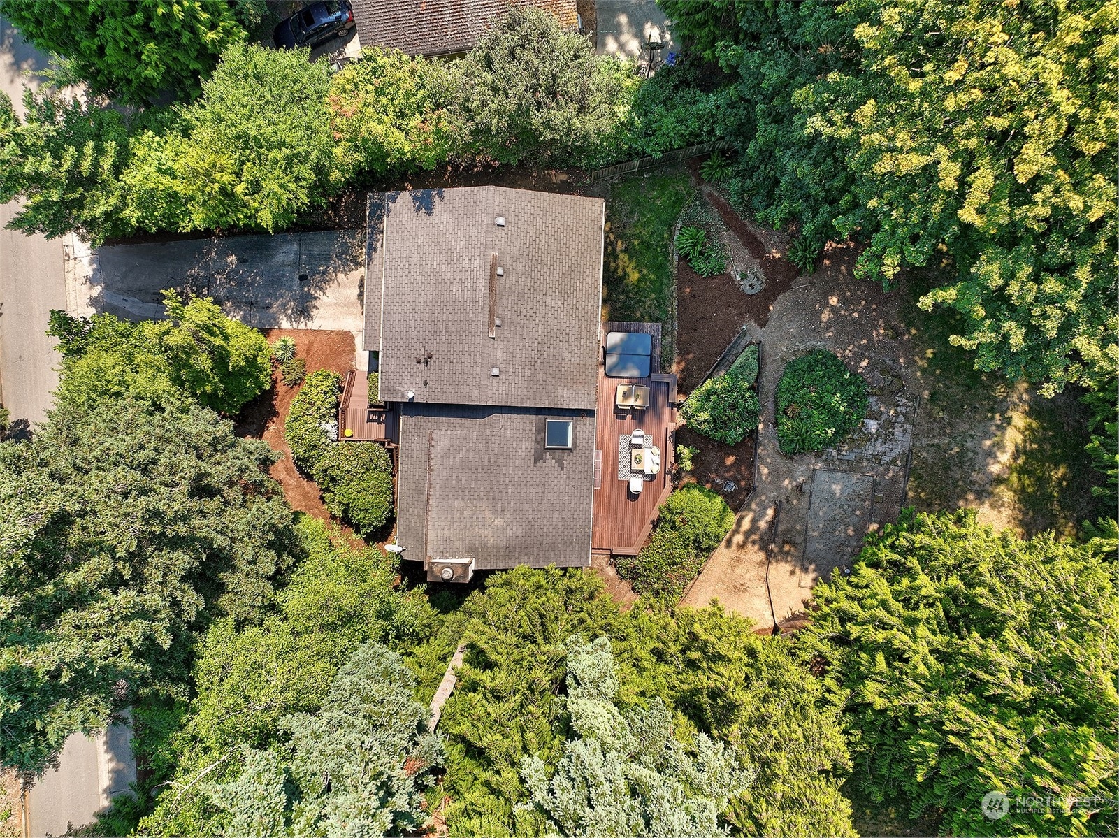 21822 4th Avenue Southeast Bothell, WA 98021 - Photo 27 of 40 an aerial view of a house with a yard and large trees