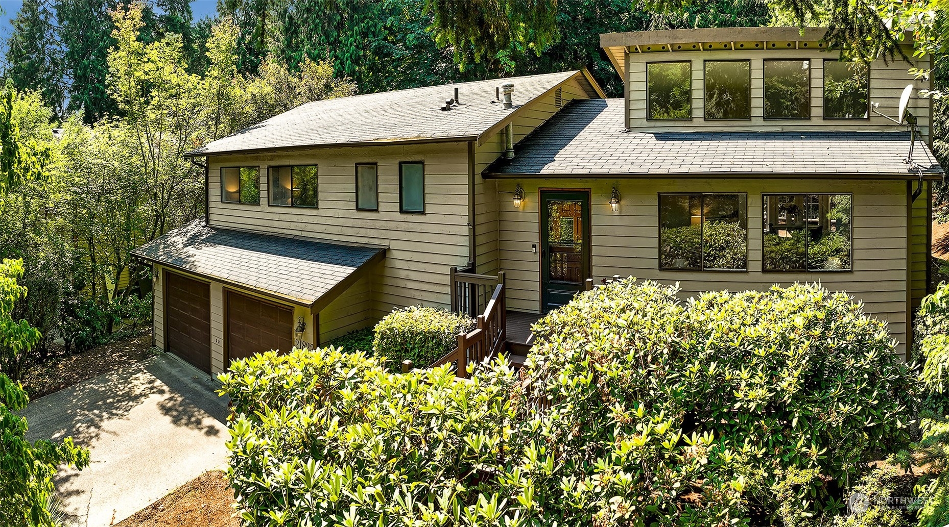 21822 4th Avenue Southeast Bothell, WA 98021 - Photo 33 of 40 a front view of a house with a yard