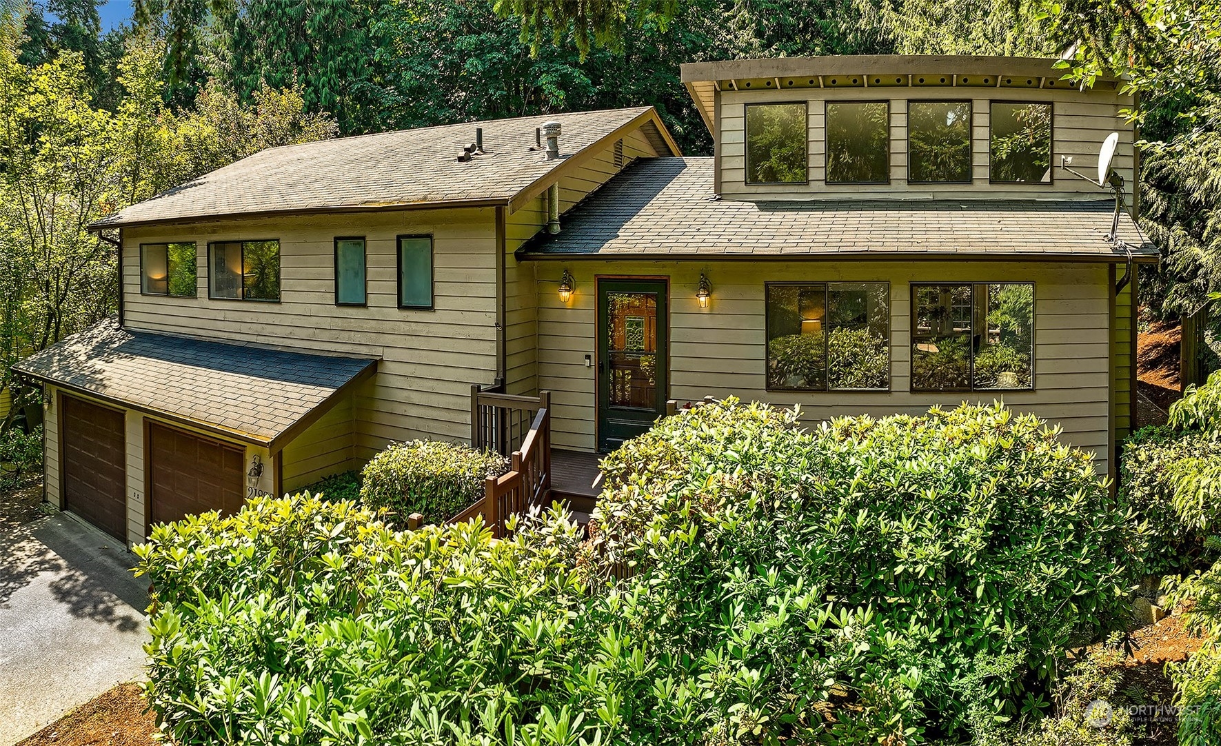 21822 4th Avenue Southeast Bothell, WA 98021 - Photo 34 of 40 a front view of a house with garden