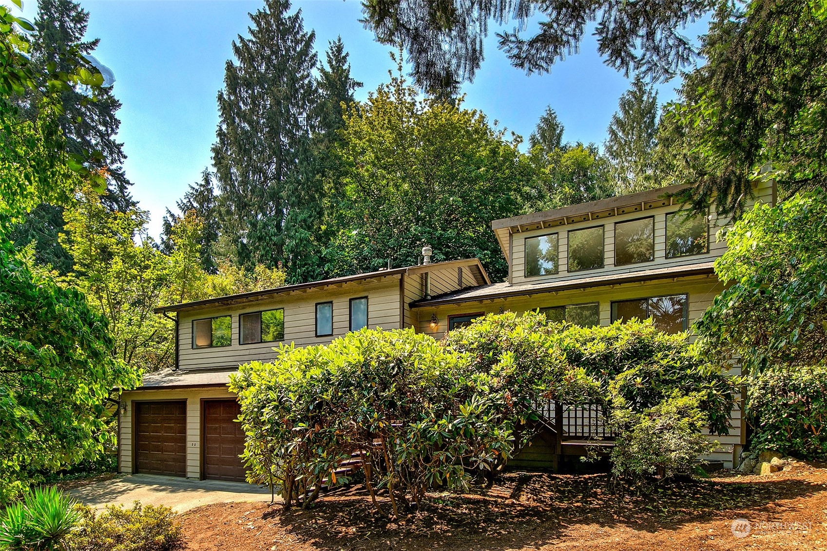 21822 4th Avenue Southeast Bothell, WA 98021 - Photo 40 of 40 a house with trees in front of it