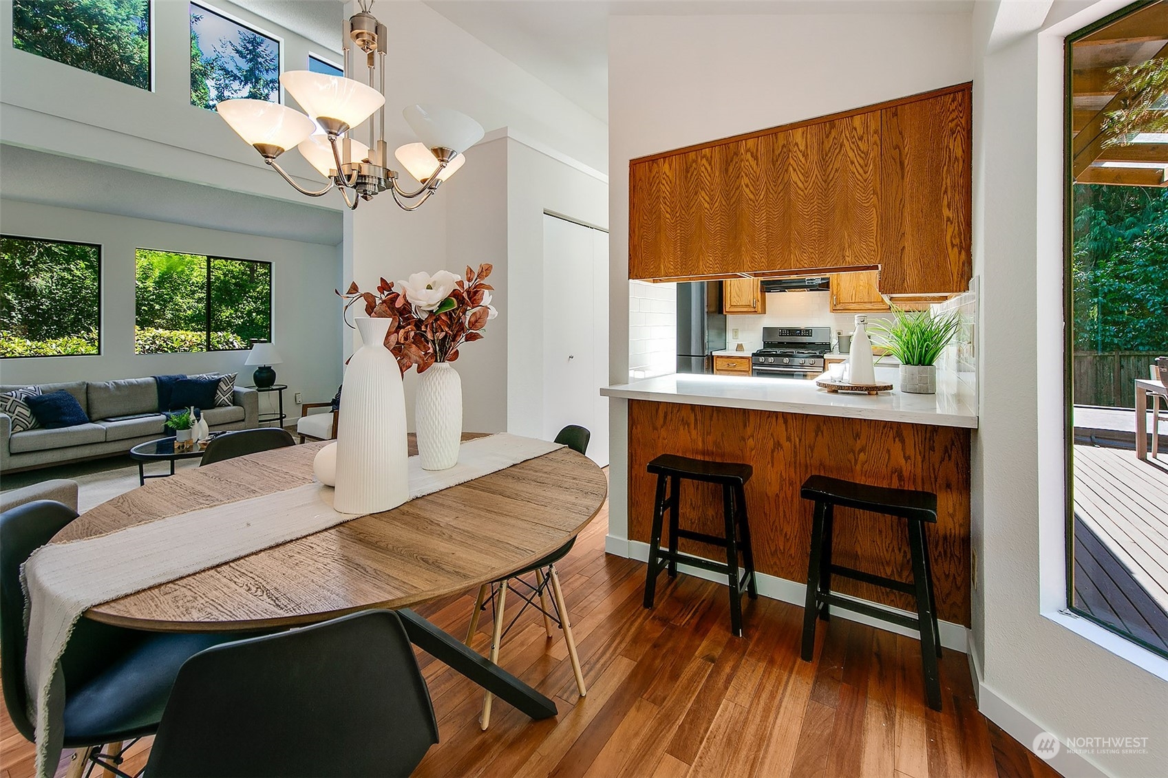 21822 4th Avenue Southeast Bothell, WA 98021 - Photo 5 of 40 a dining room with furniture a window and wooden floor