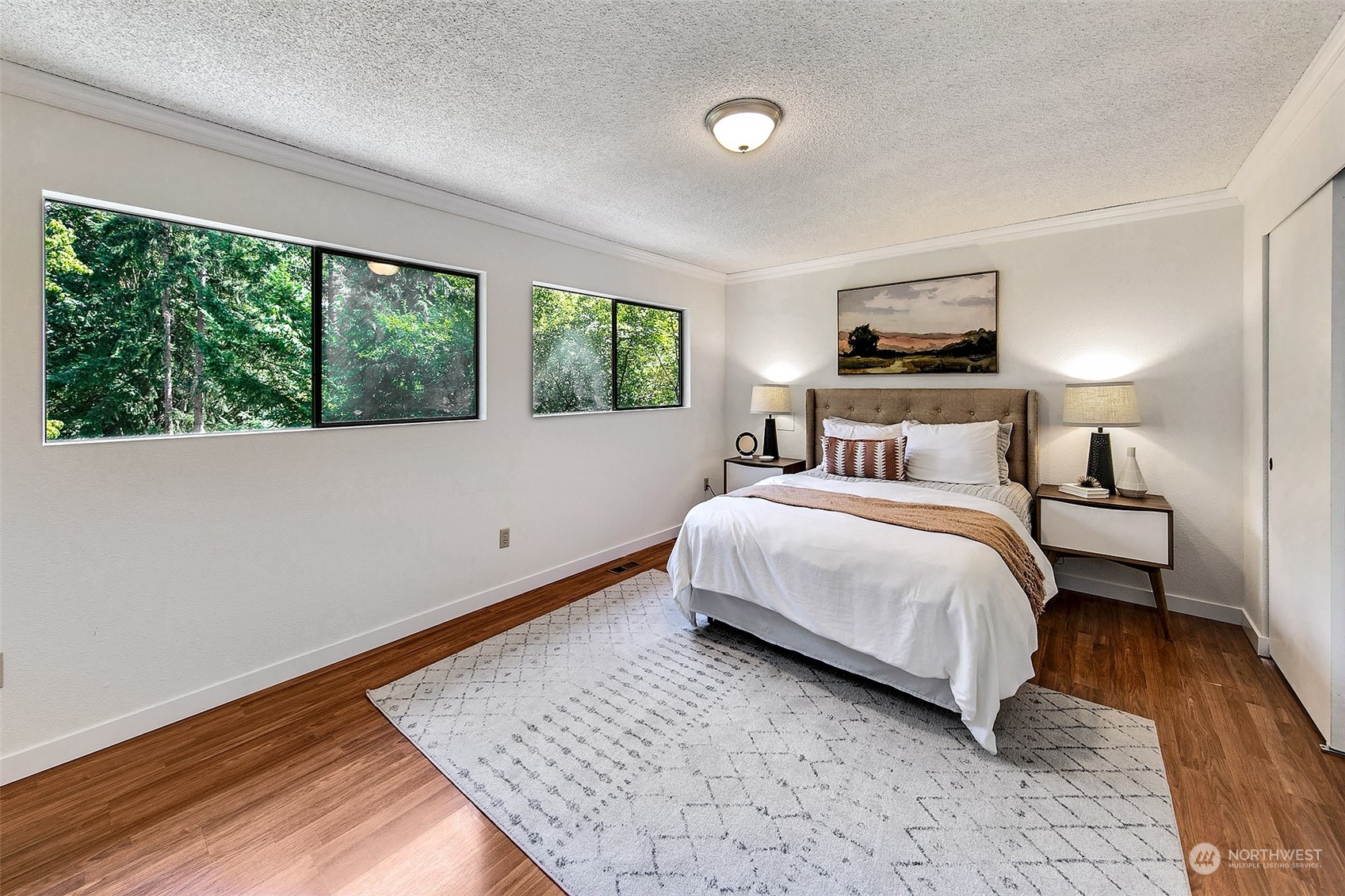 21822 4th Avenue Southeast Bothell, WA 98021 - Photo 9 of 40 a bedroom with a bed and a large window