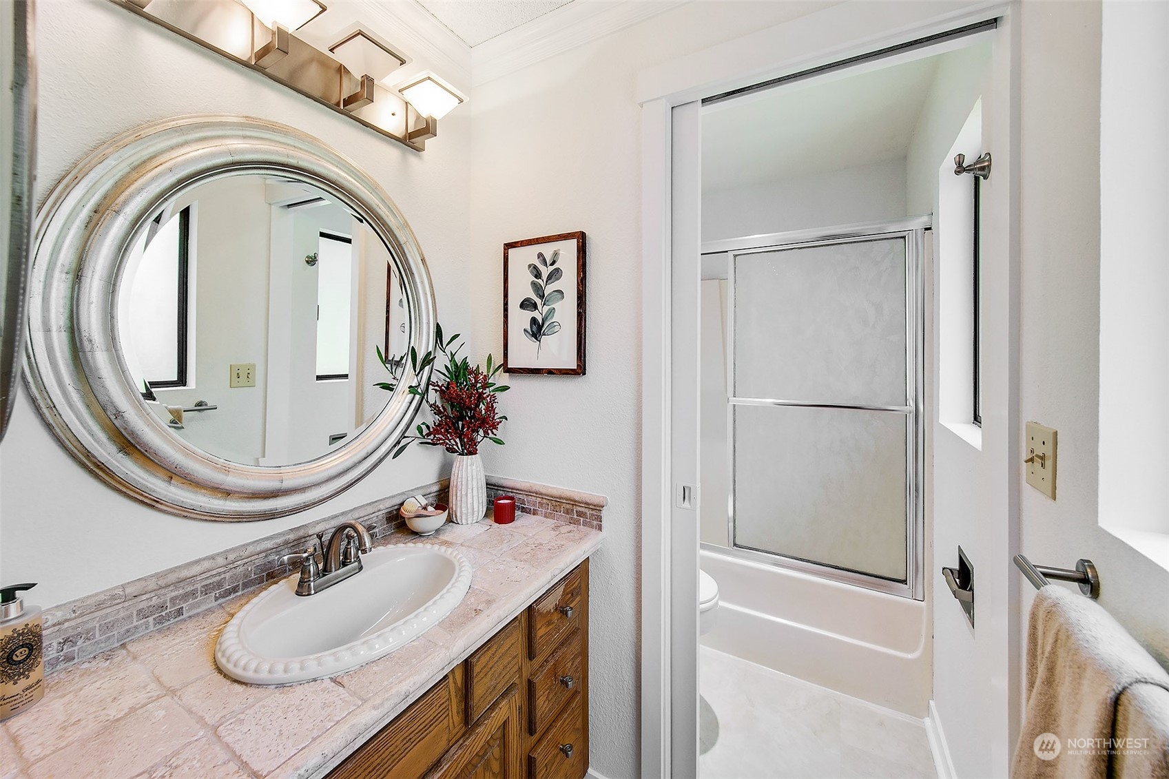 21822 4th Avenue Southeast Bothell, WA 98021 - Photo 10 of 40 a bathroom with a sink a toilet and a mirror
