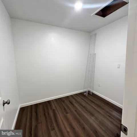 a view of small space with wooden floor