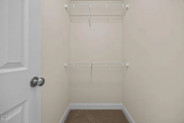 a view of small space with racks on the wall