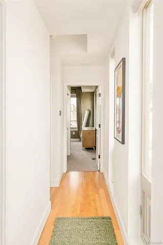 a en suite bathroom with a sink and a mirror