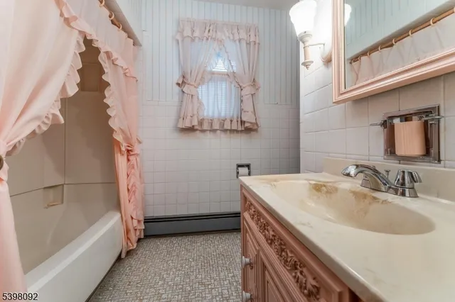 a bathroom with a sink and a bathtub