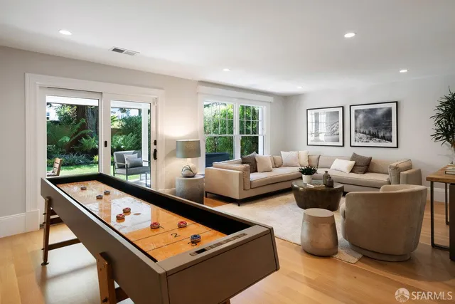 a living room with furniture and window